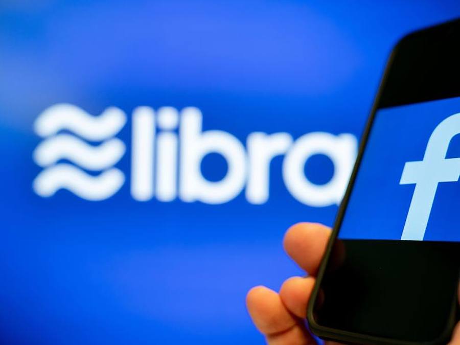Die Logos von Libra und Facebook