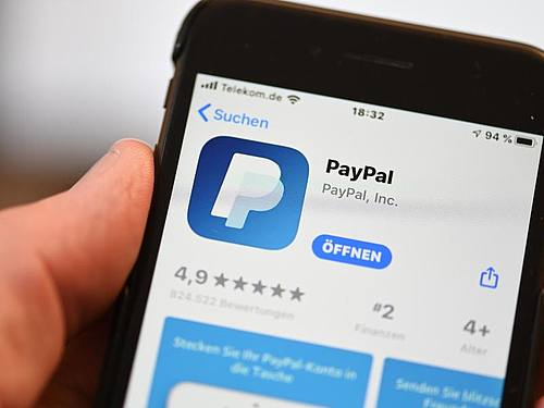 Das Zahlen per Paypal funktioniert mit elektronischem Geld, dafür brauchen beide Seiten ein Paypal-Konto. Foto: Felix Kästle/dpa