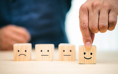 Holzwürfel mit Smilies