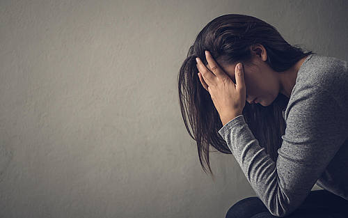 Eine müde und unmotivierte Frau
