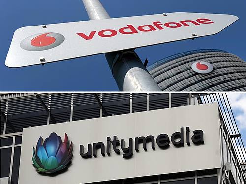 Die Logos von Vodafone und Unitymedia auf einem Banner