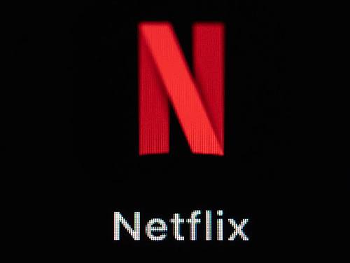 Die Netflix-App auf dem Display eines iPhone SE. Die Aktie des Konzerns ist abgerutscht. Foto: Silas Stein/dpa
