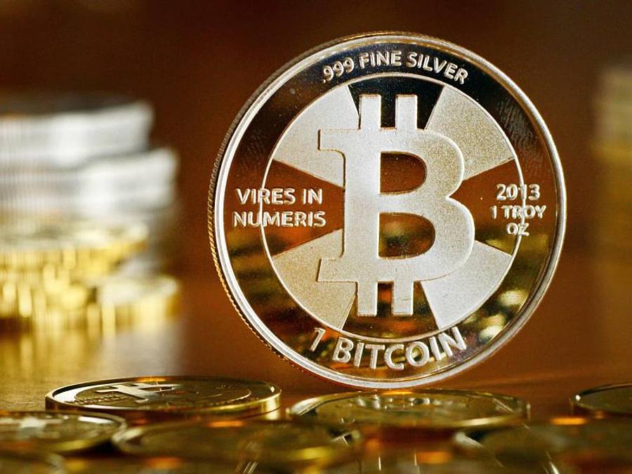 Paypal-Kunden in den USA können künftig über die Paypal-Plattform Bitcoin und andere Kryptowährungen handeln und aufbewahren. Foto: Jens Kalaene/zb/dpa