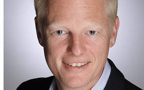 Porträt von blondem Geschäftsmann, André Nösse