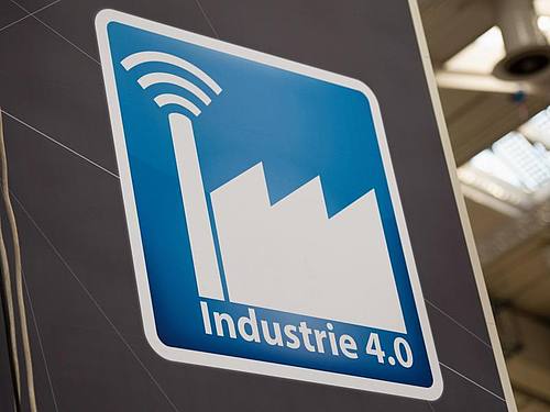 Piktogramm mit der Aufschrift „Industrie 4.0”