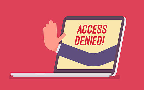 Ein Laptop mit der Aufschrift „Access Denied”