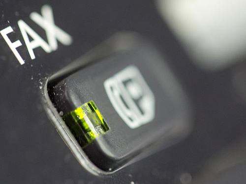Die Faxtaste an einem Multifunktionsgerät