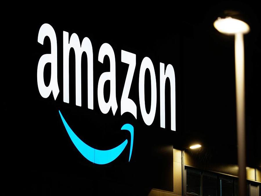 Der Schriftzug des Unternehmens Amazon. Foto: Soeren Stache/dpa-Zentralbild/dpa