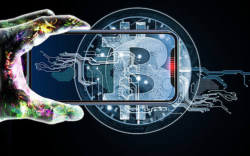 Smartphone mit Bitcoin-Symbol