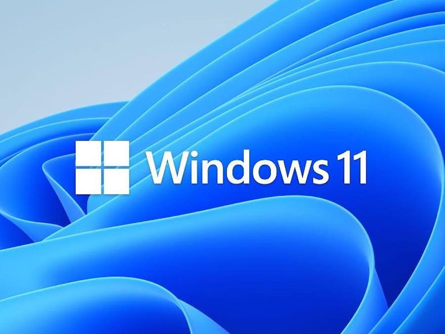 Das Windows 11-Logo mit blauem Hintergrund. Foto: Microsoft/PA Media/dpa