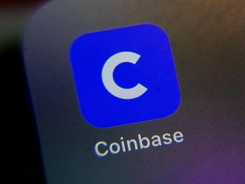 Coinbase ist die größte US-Handelsplattform für Cyber-Währungen wie Bitcoin. Foto: Richard Drew/AP/dpa