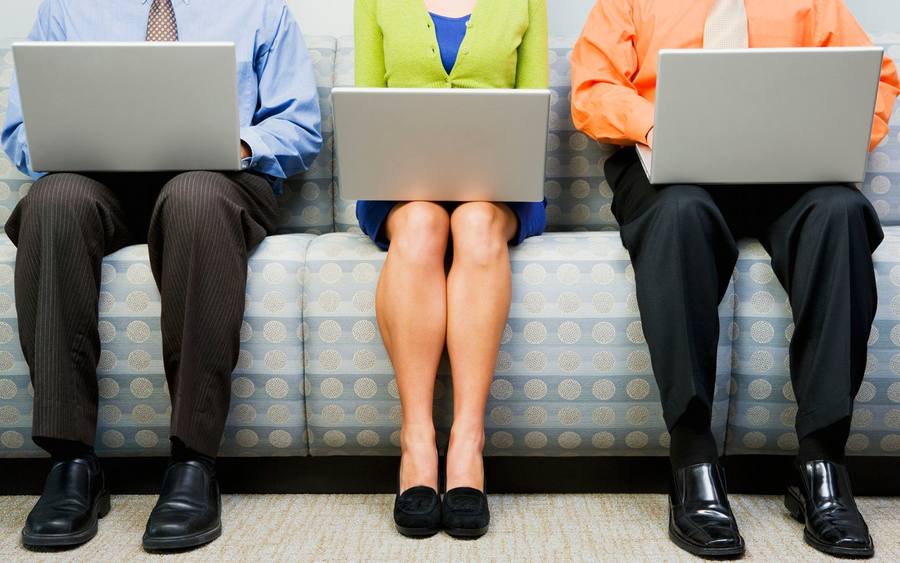 Business-Leute am Laptop