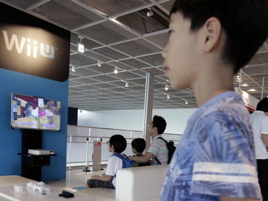 Die aktuelle Konsole Wii U, eine Weiterentwicklung der überaus erfolgreichen Wii, verfehlte die Erwartungen und liegt beim Absatz weit hinter den Konkurrenzgeräten Playstation 4 von Sony und Xbox One von Microsoft. Foto: Kiyoshi Ota