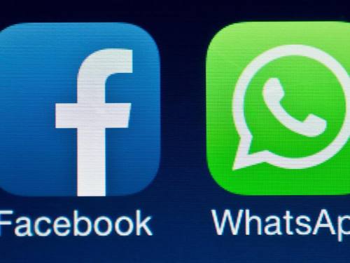 Die beiden Logos von Facebook und WhatsApp. Foto: Patrick Pleul/Illustration