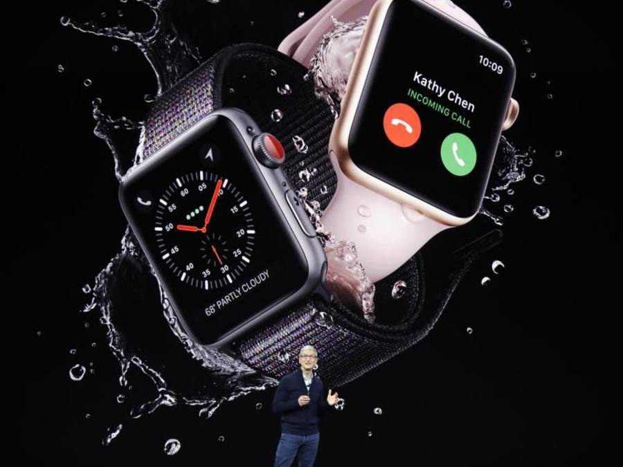 Die Apple Watch auf einem Bildschirm während einer Präsentation vom Firmen-Chef Tim Cook. Foto: Marcio Jose Sanchez