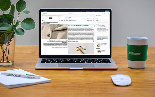 Notebook zeigt Website von Hessnatur