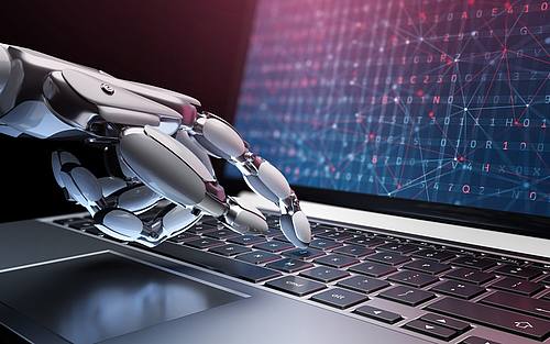 Roboterhand bedient Computer