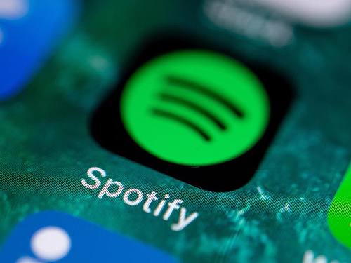 Die Zahl der Abo-Kunden bei Spotify stieg binnen drei Monaten von 144 auf 155 Millionen. Foto: Fabian Sommer/dpa