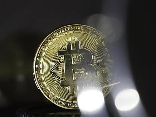Bitcoins können reich machen - vorausgesetzt, man erinnert sich an sein Passwort. Foto: Ina Fassbender/dpa