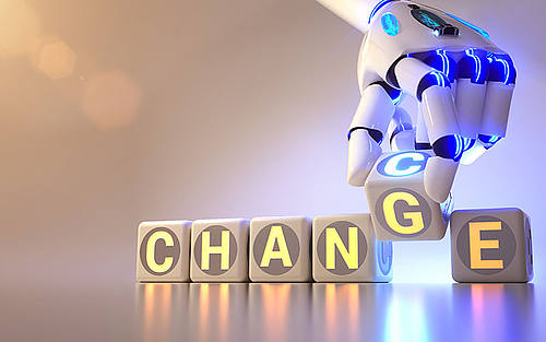 Roboterhand und das Wort Change
