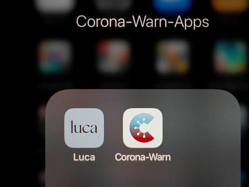 Die Icons der Corona-Warn-Apps Luca und die Corona-Warn-App der Bundesregierung auf einem Smartphone. Foto: Kay Nietfeld/dpa