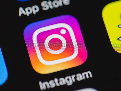 Das Logo von Instagram auf einem Apple iPhone. Foto: picture alliance / dpa